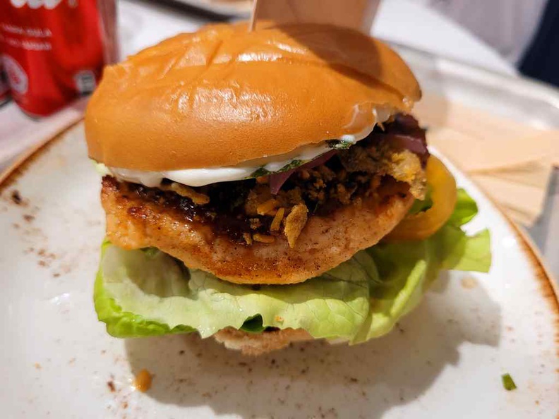 Singaporean burger ($9.90) loaded with Sambal slaw, pickled onion, cucumber and salted egg