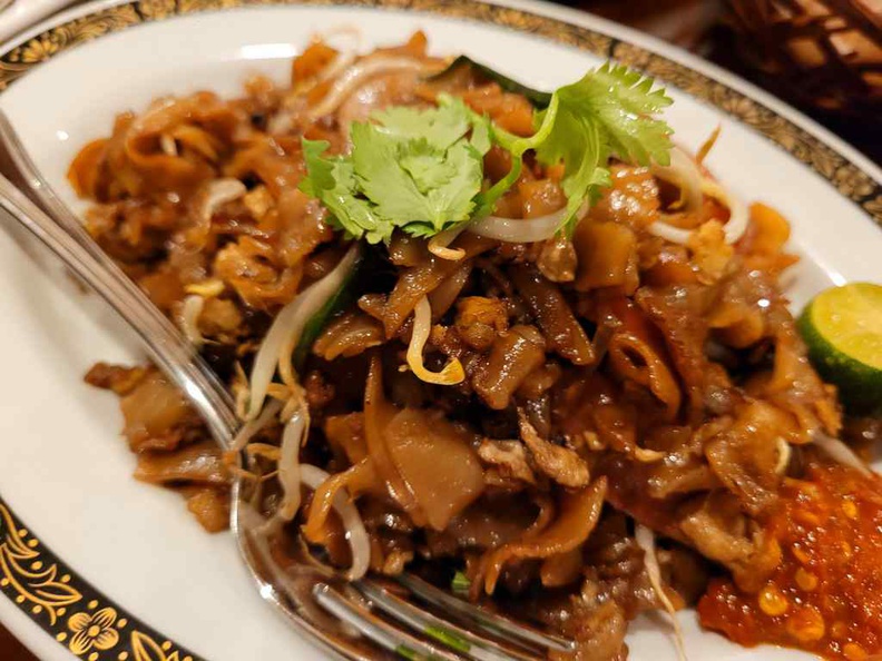 Free flow of Char Quay Teow, a sinful gastronomical affair. Served with chili sand lime