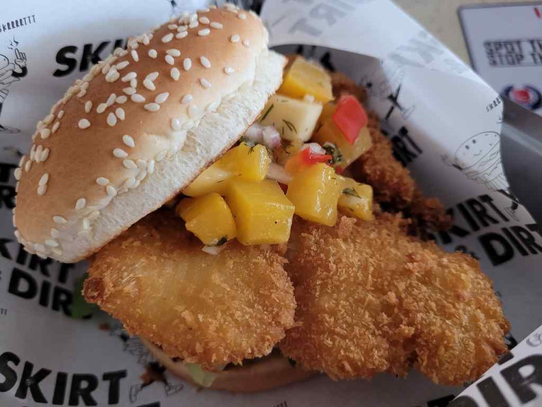 Skirt and Dirt burgers Fish crisp burger ($5.80). The fish cutlet is large, juicy and cooked nicely hot between buns and tropical salsa