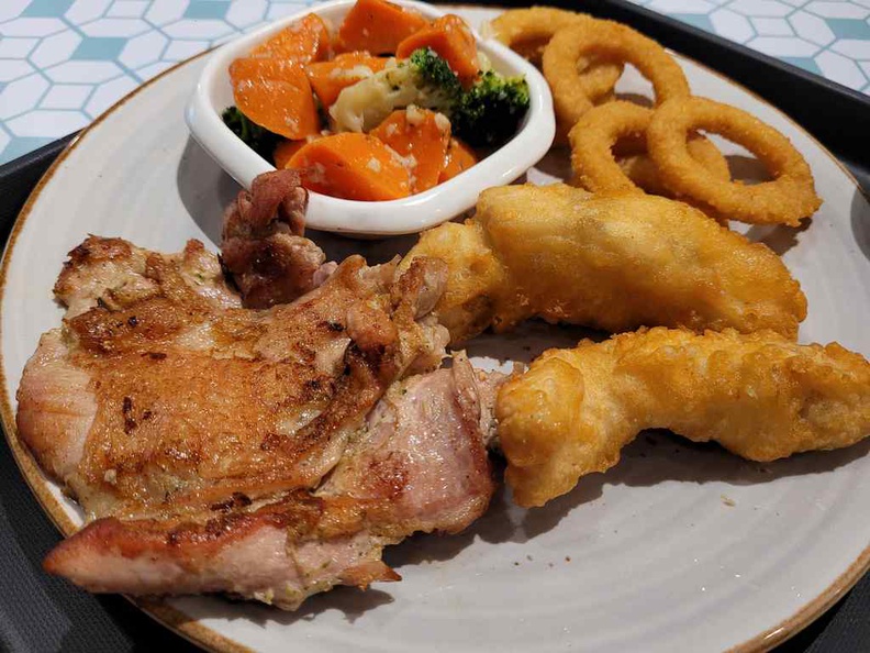 Hainan story Best of both worlds ($16.90), grilled chicken chop, and barramundi fish fritters