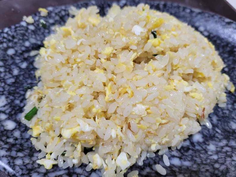 You can't go wrong with plain old egg fried rice. It is cooked using short grain stubby rice