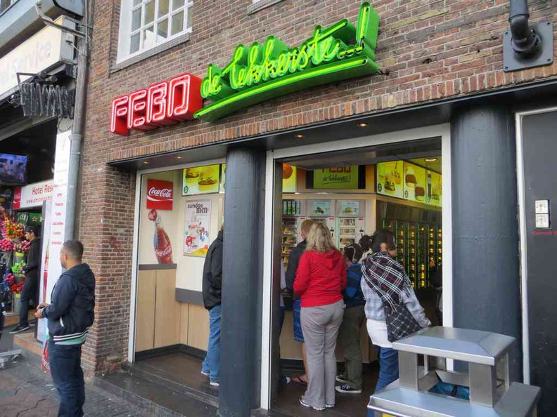 Amsterdam Netherlands Febo capsule fast food store selling quick burgers, hotdogs and fries