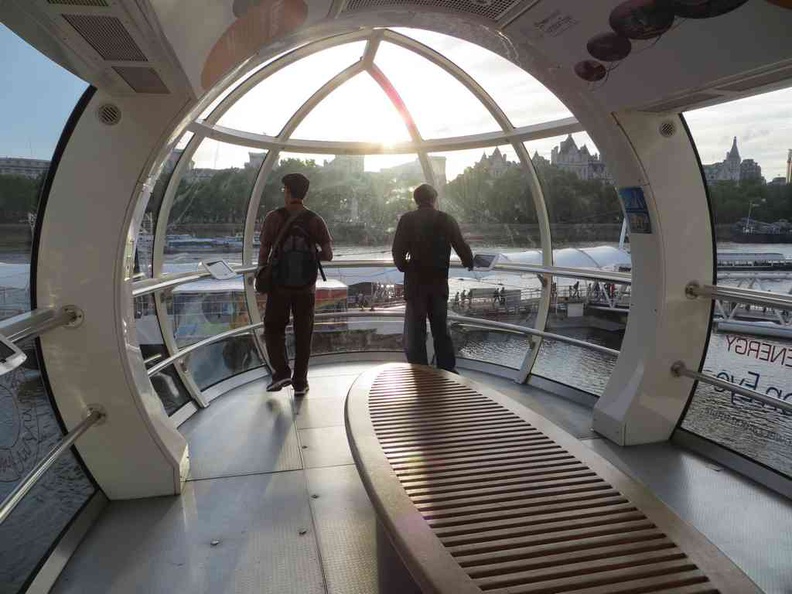 In the capsule, it is modern open and clean with a central bench
