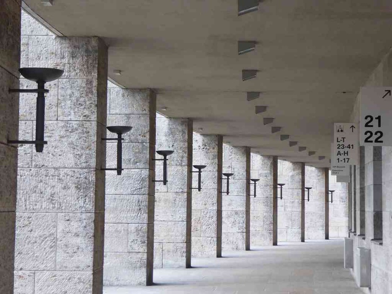 The rows of support gallery columns are reminiscent of pre-war architecture and does bare a Colosseum resemblance