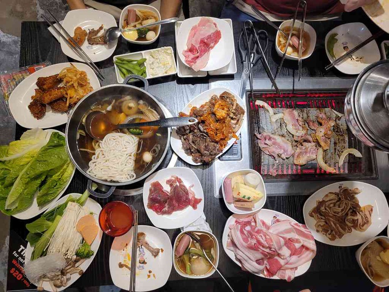A spread, can't decide between a Korean BBQ or a shabu shabu, why not both