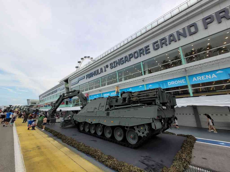 At the F1 pit building with the displays running along side the building