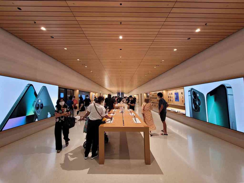 The Apple Store Marina Bay Sands basement walkway from the entrance with products taking center stage