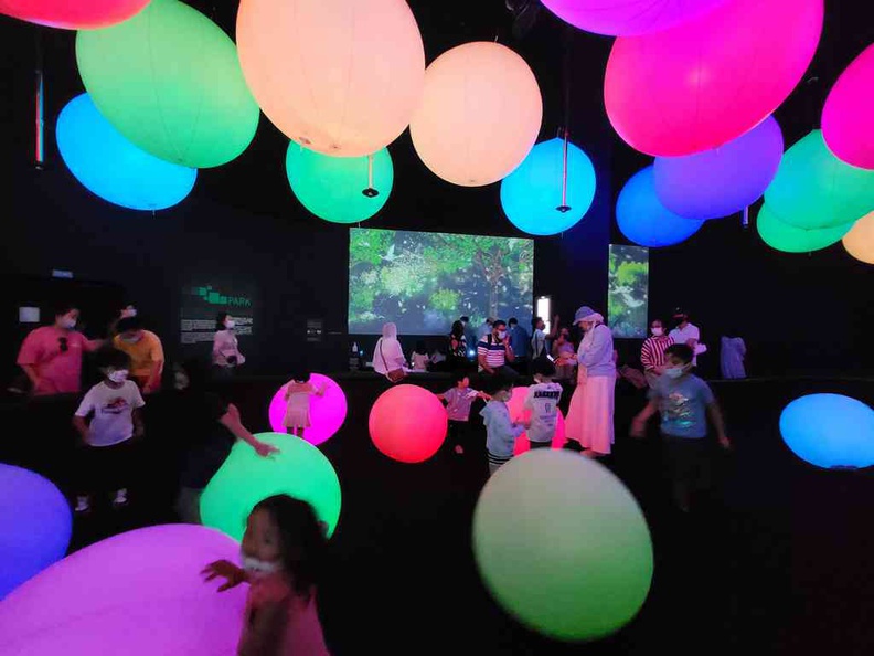 Future World Art Science Museum colourful lit play balls at center stage in the sketch town gallery