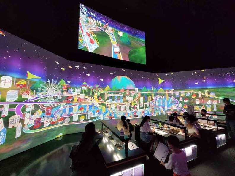 The impressive sketch town area with live projection screens and crayon tables in view Future World Art Science Museum