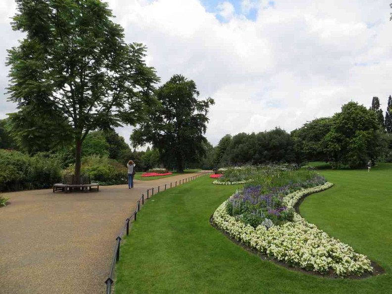 The green spaces and flower beds in the summer at the London Hyde Park grounds