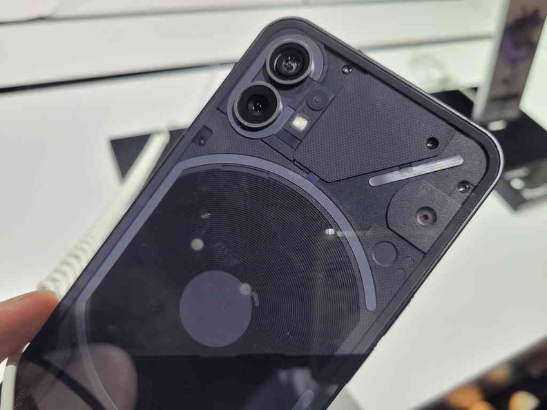 Rear panel in black with the glyph pattern stripes and twin 50MP rear cameras