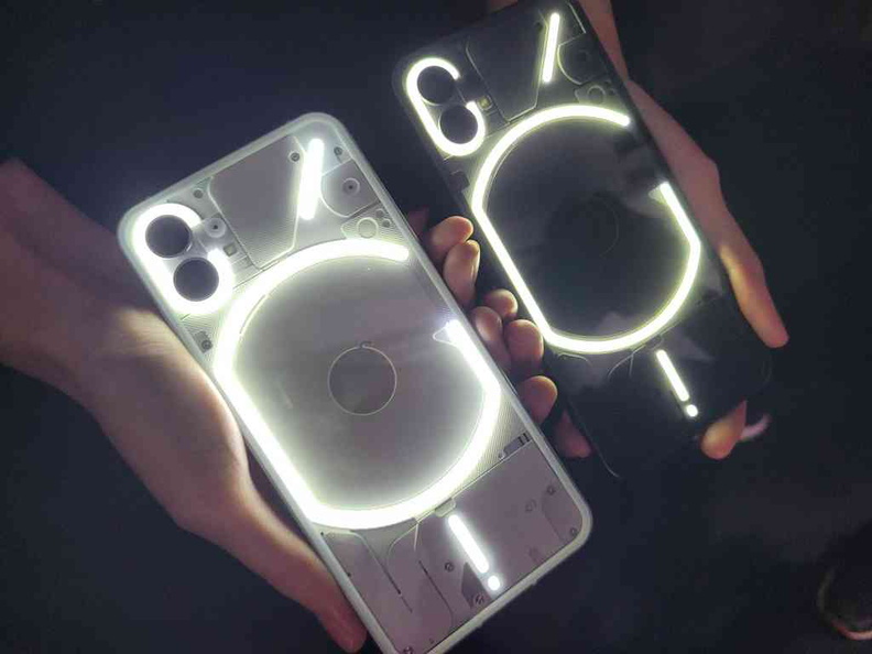 Nothing Phone 1 Rear glyph patterns all lit up in both white and black colours
