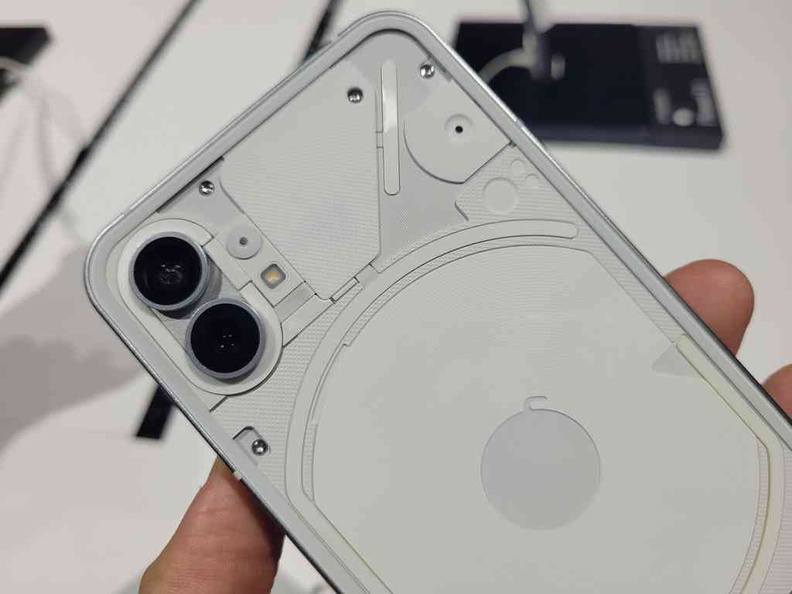 The Nothing Phone 1 dual camera setup at the top left of the rear panel with screws visible in white colour variant