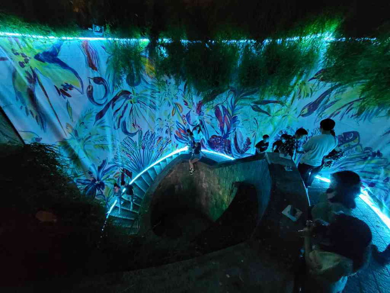 The Fort canning underground tunnel lit in a calming alien blue