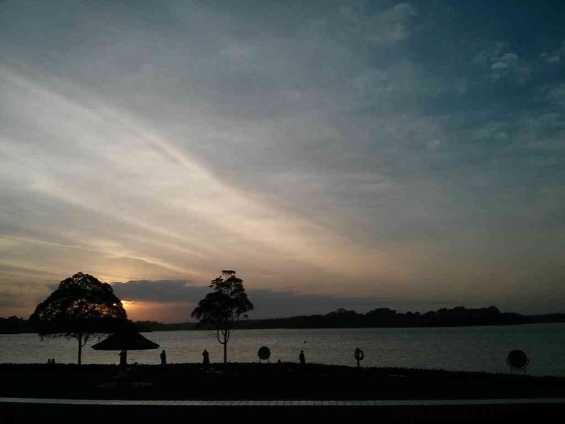 Sunset at Seletar Reservoir over looking the Mandai and natural reserve in the distance
