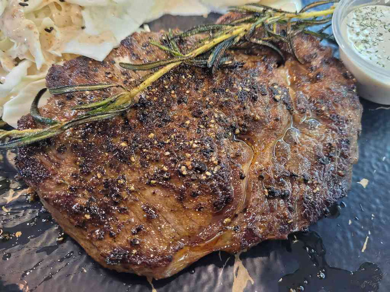 Nicely marinated ribeye steak ($22.90) with white sauce