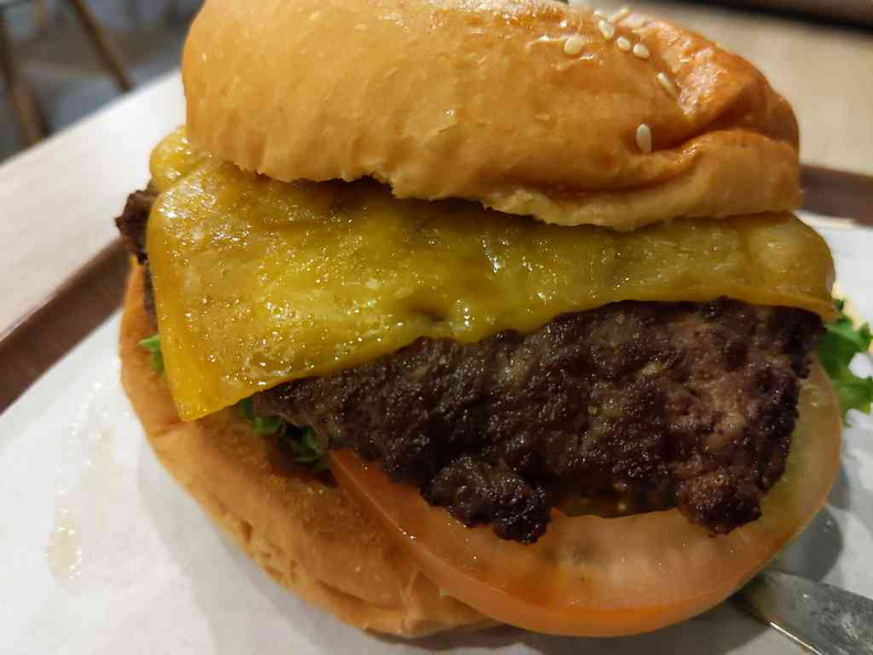 Grub cheeseburger ($14.80), a messy but flavorful affair typical of gourmet feat
