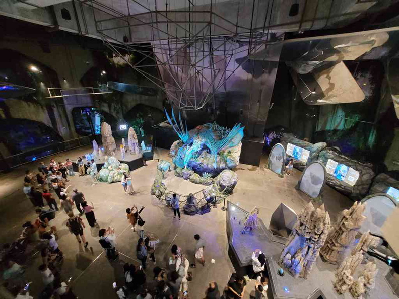 Overview of the central event area inside the cloud forest main mountain building, with an animatronic Leonopteryx taking center stage