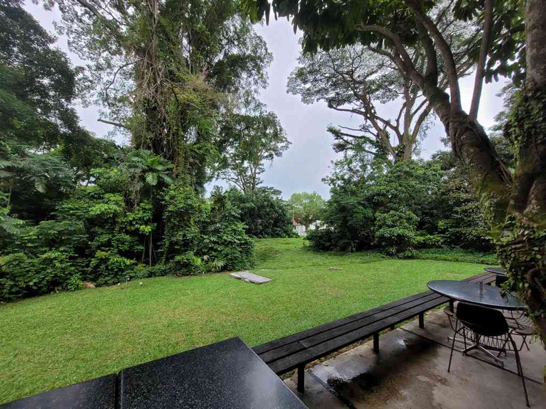 PS cafe outdoor dining area overlooking greenery at their Dempsey branch