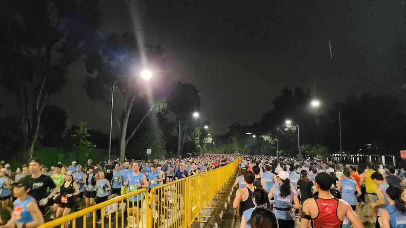 The mass of runners along Republic avenue at the start of the race pre-dawn