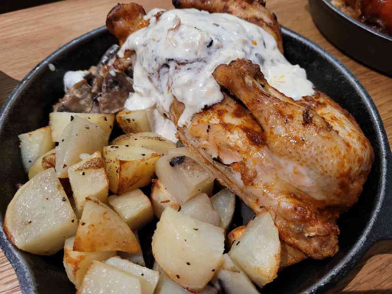 Half roast chicken, one of the heartier choices here at Wursthans, best paired with sides of seasonal potatoes