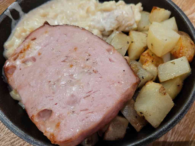 Meatloaf with mac and cheese and potatoes sides