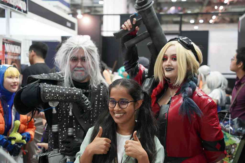 Cosplayers with attendees posing for photos at the Singapore Comic Con 2022