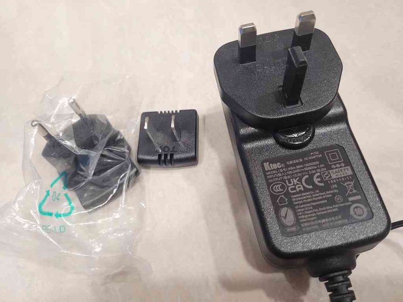 Multi power adapter with 3 interchangeable plug heads for your region