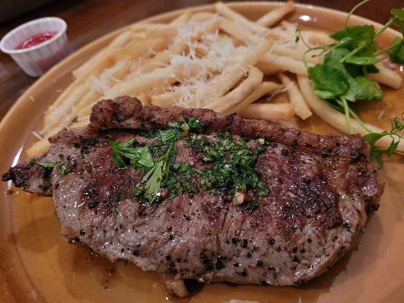 Steak Frites & Chimichurri Angus Striploin with Parmesan Truffle Fries, one of Riders cafe more pricey ($35.00) offerings.