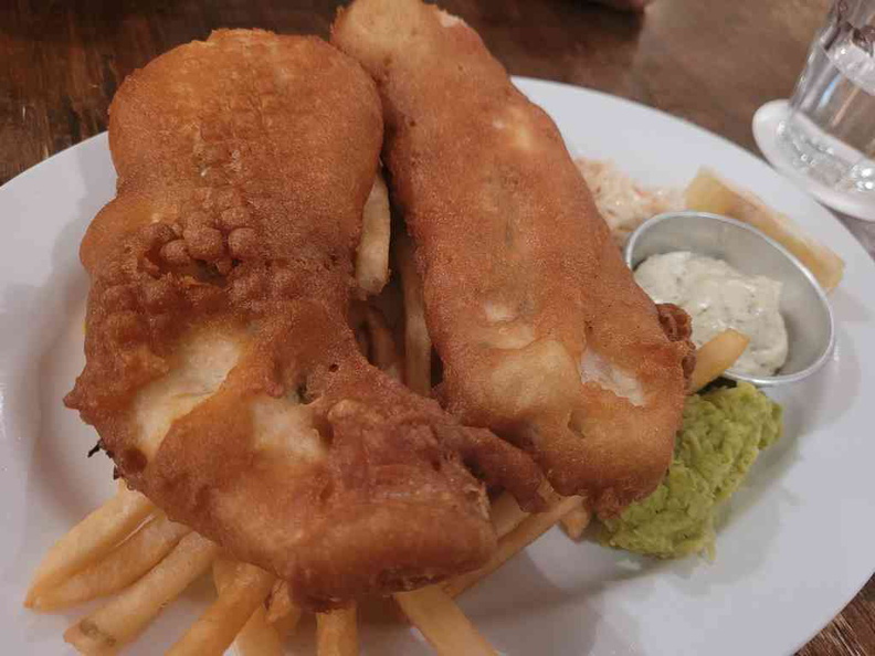 Beer-Battered Barramundi & Chips, served with House Slaw, Mashed Peas and Dill-tartare sauce on the side ($25)