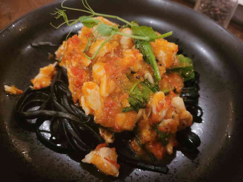 Squid Ink & Lump Crab Arrabiata Squid ink Linguine ($25)