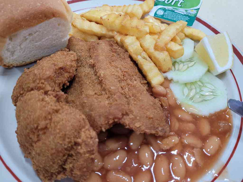 Fried fish and chips with slice of lemon