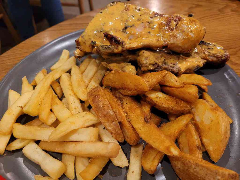 Fries and wedges sides of the trade paired with your half chicken