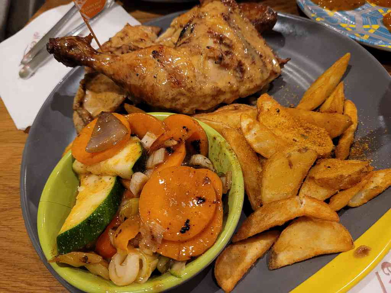 Peri Peri chicken with wedges and garden vegetable sides ($21.69)