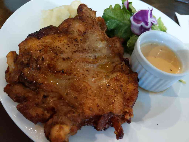 Grilled chicken chop served with mashed potatoes and salad ($15.90)