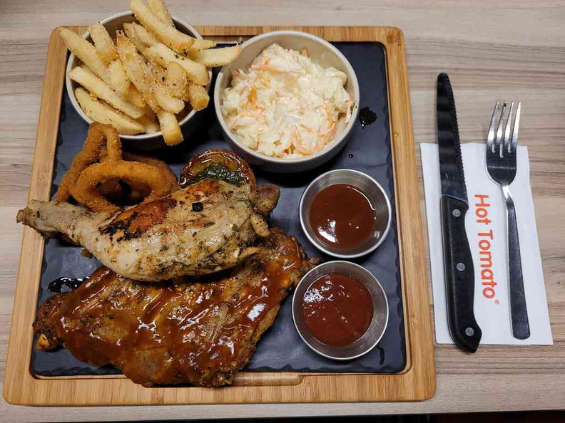 Hot Tomato's mixed premium grill platter ($21.90), served with coleslaw and fries