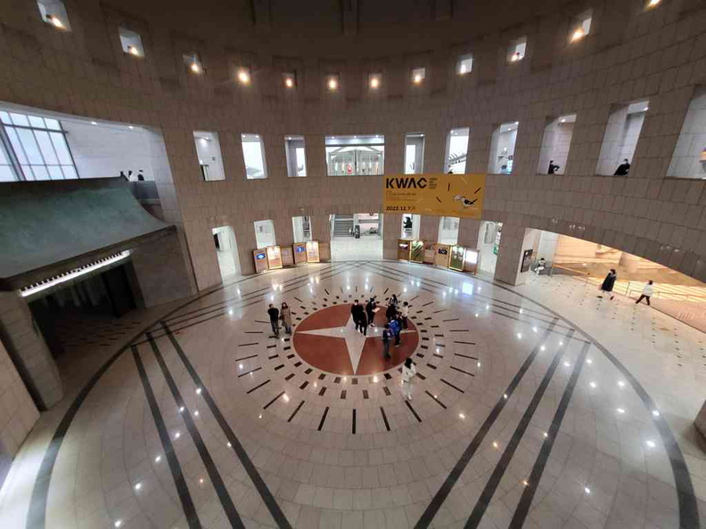 View of the building main central lobby from the second floor galleries