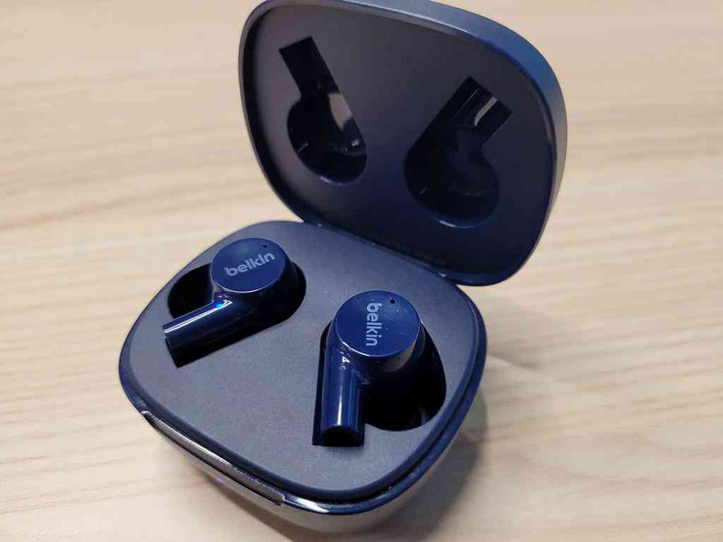 The charging case of the Soundform charges on top of storing them.