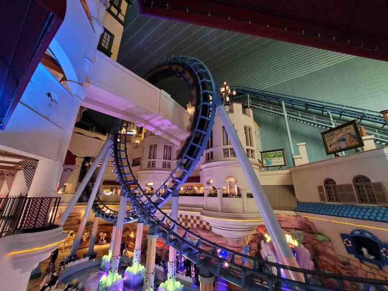 The French Revolution roller coaster doing the loop within the interior park grounds in Lotte world theme park