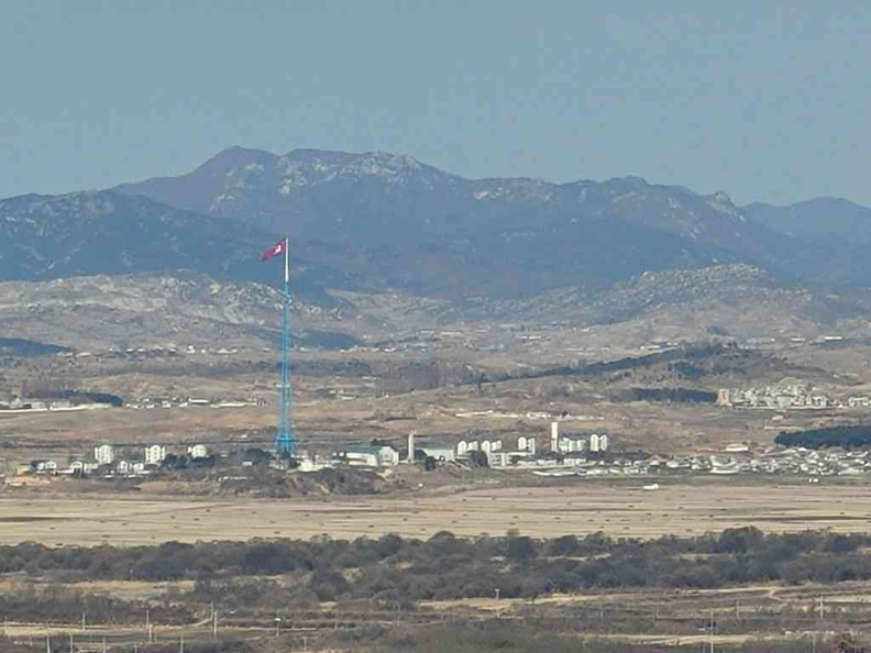 North Korean propaganda towers and flag pole in the distance