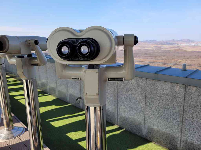 Rooftop telescopes at the top open deck of the Dorasan Observatory. They are free to use and provide for a close-up of the activities across the border