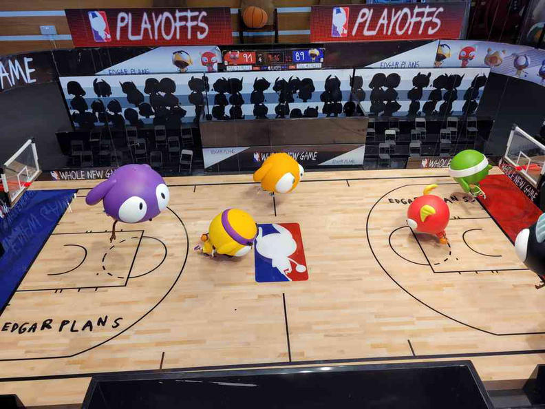 Basketball court with the toy figures playing an indoor court match as one of the exhibits in the show