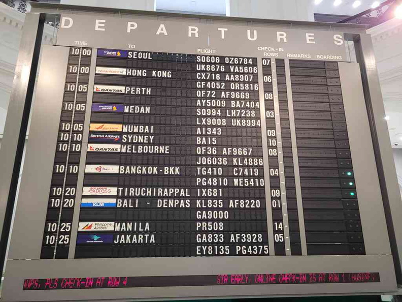 Departure flip board feature piece sitting center stage at the National Museum main rotunda entrance