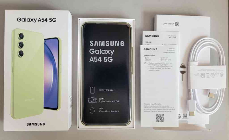 The Samsung A54 phone review out of the box, with included USB-C cable with no charger unit.