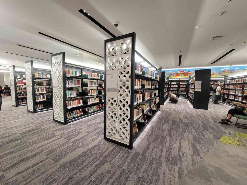 Library shelves with the iconic flower shaped tiles.