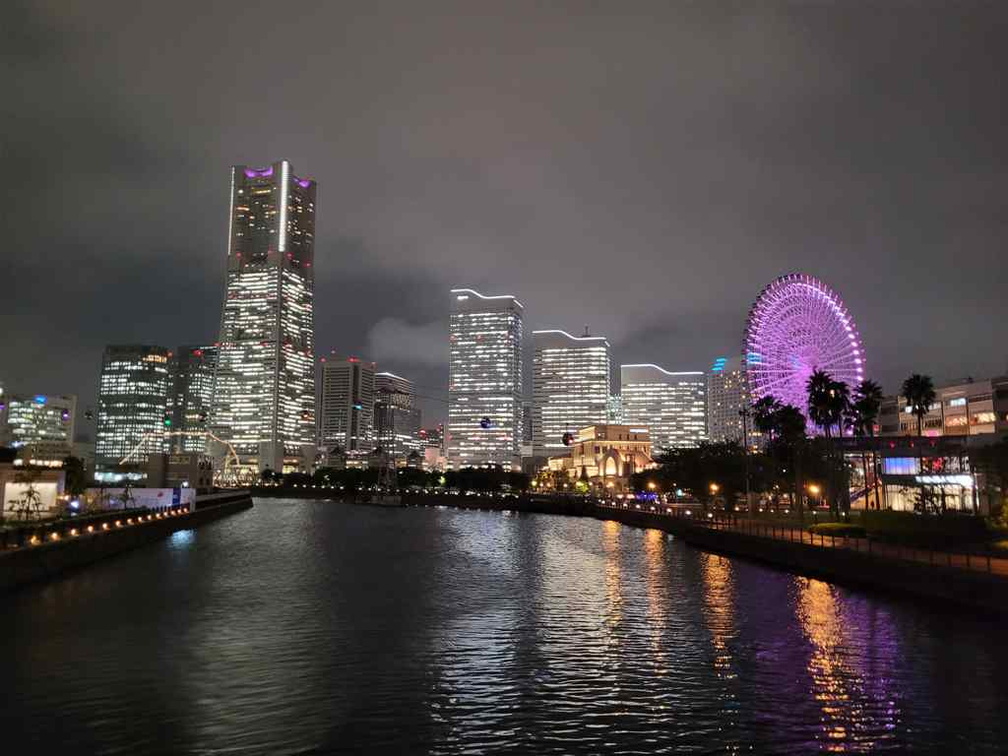 Yokohama landmark tower and Shinko Island at night.