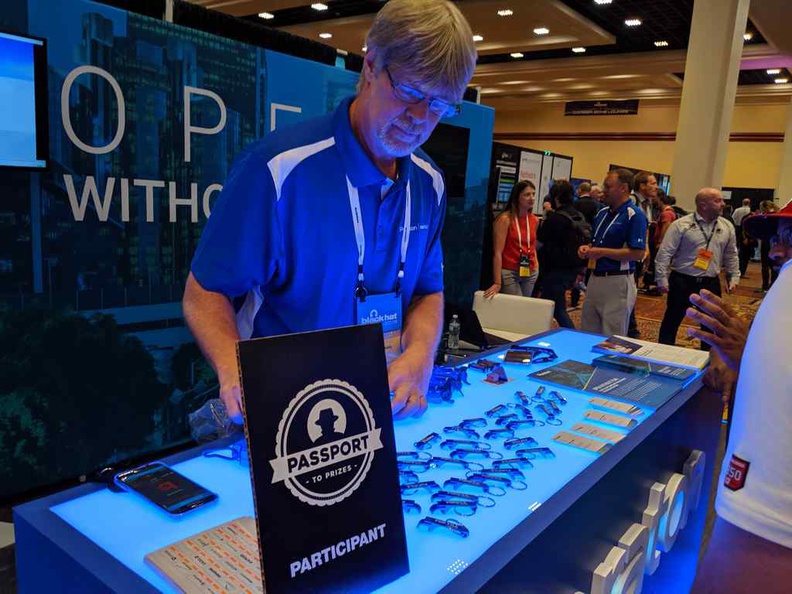 A participating company of the Blackhat Passport treasure hunt, identified by these signs on their booths