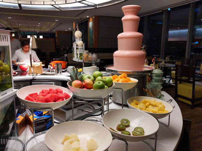 The strawberry fondue at the dessert island, with a selection of fruits to go with it