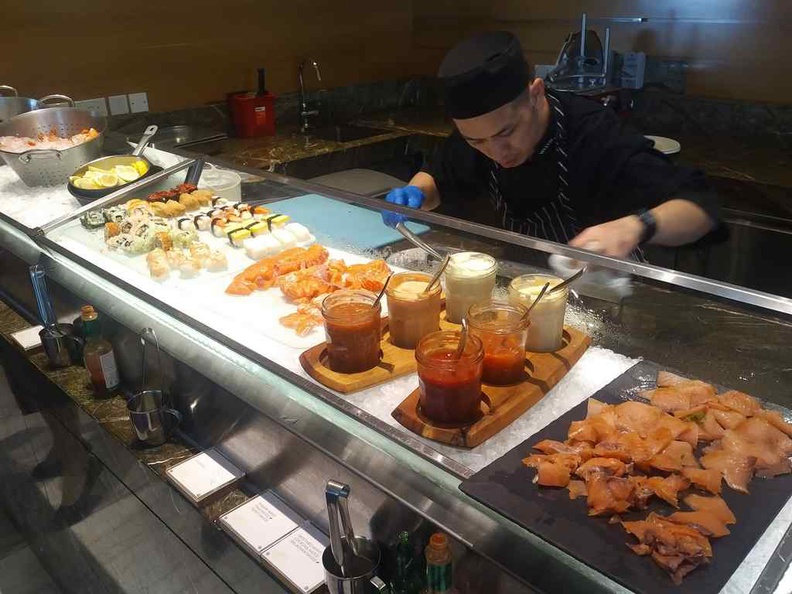 The buffet lunch selection with a smaller seafood section merged with the Sushi counter