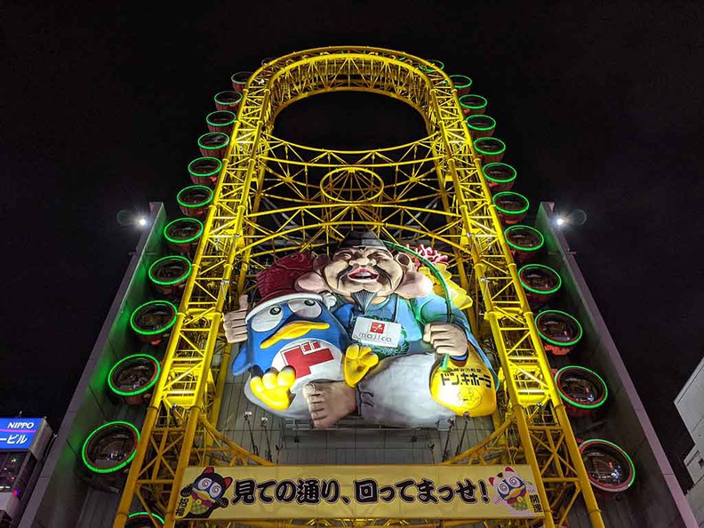 Don Quijote Dotonbori with the odd shaped Ferris wheel on the building